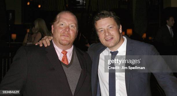 Chefs Mario Batali and Jamie Oliver attend 2nd Annual Mario Batali Foundation Honors Dinner at Del Posto Ristorante on October 6, 2013 in New York...