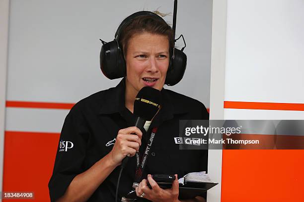 Radio 5 pitlane reporter Jennie Gow at work during the Korean Formula One Grand Prix at Korea International Circuit on October 6, 2013 in...