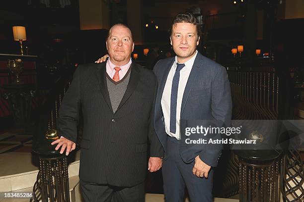 Mario Batali and Jamie Oliver attend 2nd Annual Mario Batali Foundation Honors Dinner at Del Posto Ristorante on October 6, 2013 in New York City.