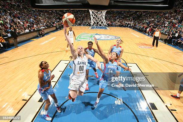 Lindsey Moore of the Minnesota Lynx shoots a layup against Courtney Clements of the Atlanta Dream during Game 1 of the 2013 WNBA Finals on October 6,...