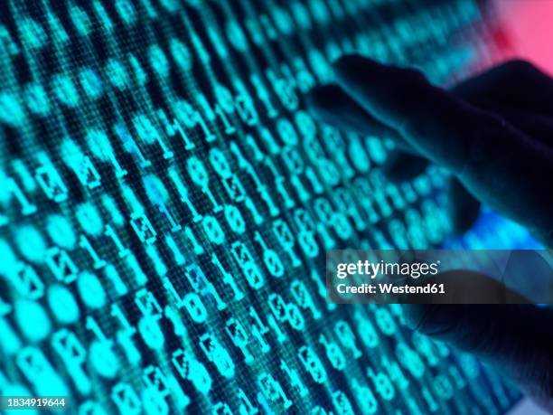 Binary Code Screen Photos and Premium High Res Pictures - Getty Images