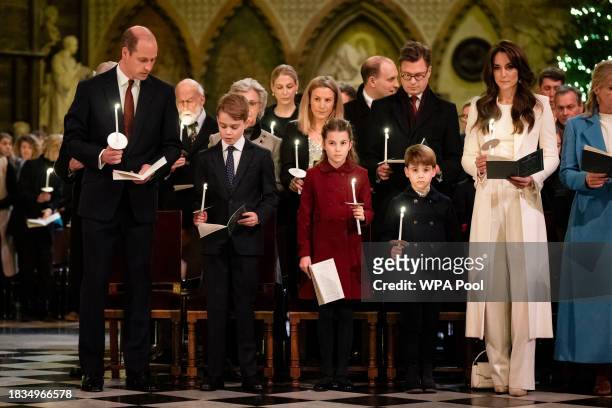 Prince William, Prince of Wales, Prince George, Princess Charlotte, Prince Louis and Catherine, Princess of Wales during the Royal Carols - Together...