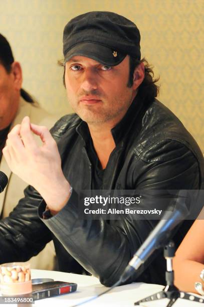 Director Robert Rodriguez attends Open Road Films' "Machete Kills" press conference at Four Seasons Hotel Los Angeles at Beverly Hills on October 6,...