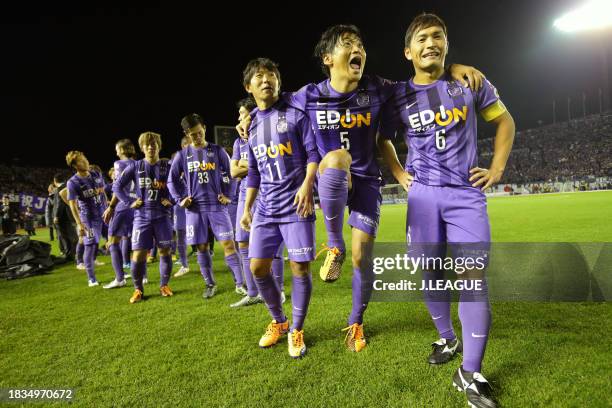 Hisato Sato, Kazuhiko Chiba and Toshihiro Aoyama of Sanfrecce Hiroshima are seen before the award ceremony following the J.League Championship second...