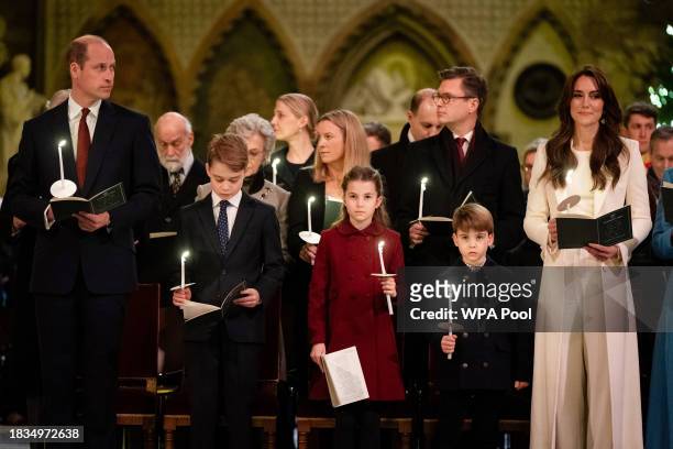 Prince William, Prince of Wales, Prince George, Princess Charlotte, Prince Louis and Catherine, Princess of Wales during the Royal Carols - Together...