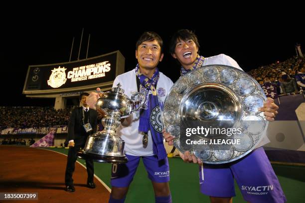 Toshihiro Aoyama and Hisato Sato of Sanfrecce Hiroshima celebrate the J.League J1 season champions after the team's 4-3 aggregate victory in the...