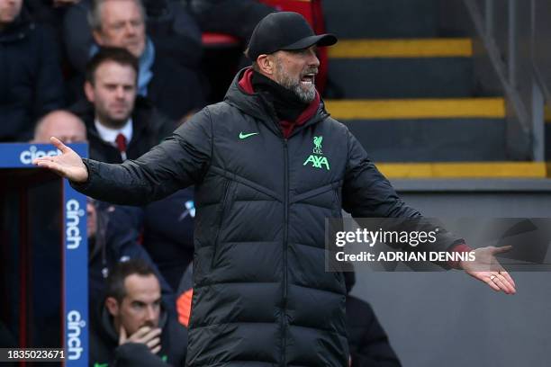 Liverpool's German manager Jurgen Klopp reacts after a penalty is given to Palace during the English Premier League football match between Crystal...