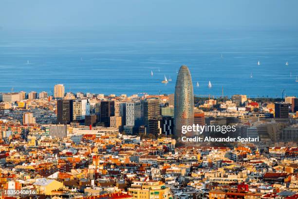 aerial view of 22@ district cityscape in poble nou, barcelona, spain - torre agbar stock pictures, royalty-free photos & images