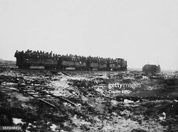 British Army Royal Engineers working party from the British Expeditionary Force being transported back from the line on narrow gauge trench Light...