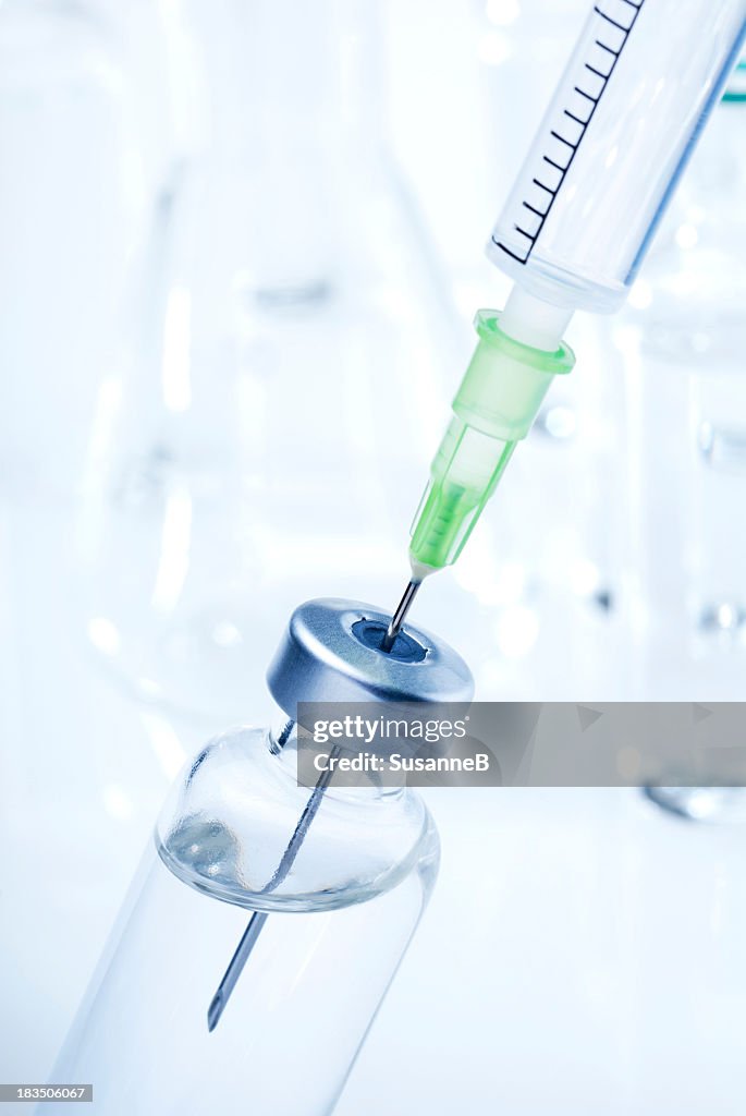 A needle and syringe extracting insulin