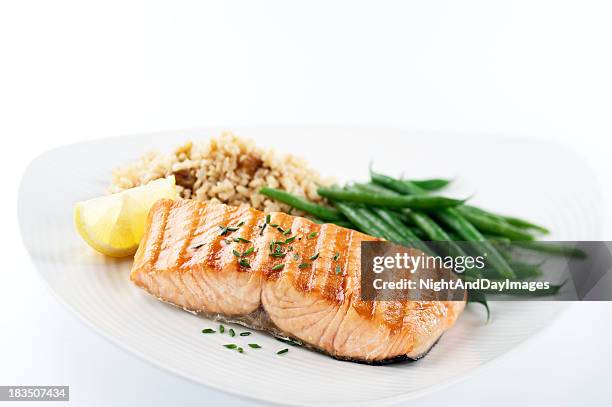 healthy salmon dinner - fish dinner stock pictures, royalty-free photos & images