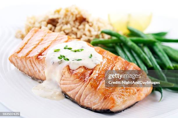 healthy salmon dinner - savory sauce bildbanksfoton och bilder