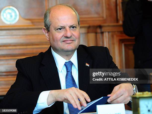 Serbian Foreign Minister Ivan Mrkic waits before his meeting with his Hungarian counterpart in the Hungarian Ministry for Foreign Affairs of Budapest...