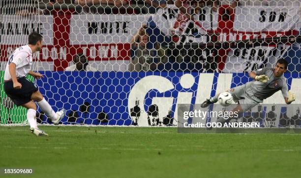 Portuguese goalkeeper Ricardo saves a penalty kick of English midfielder Frank Lampard during the penalty kick of the World Cup 2006 quarter final...