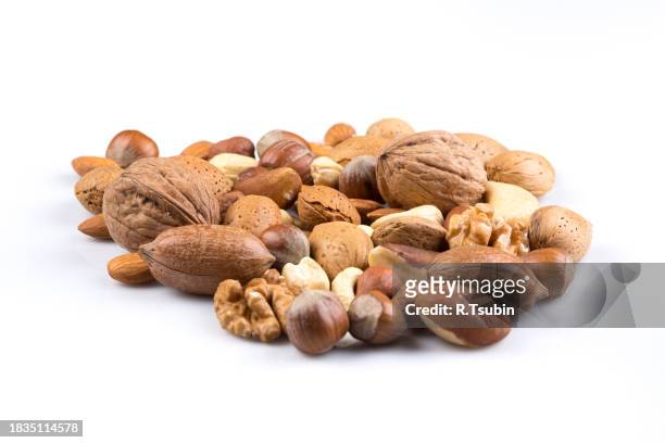 variety of mixed nuts - walnuts stock pictures, royalty-free photos & images