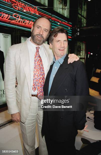 English actors John Cleese and Michael Palin attend the film premiere of Robert Young and Fred Schepisi's 'Fierce Creatures' at the Empire cinema,...