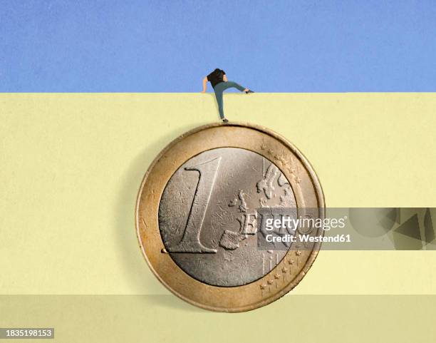 man standing on oversized euro coin climbing over wall - 1 euro stock-grafiken, -clipart, -cartoons und -symbole