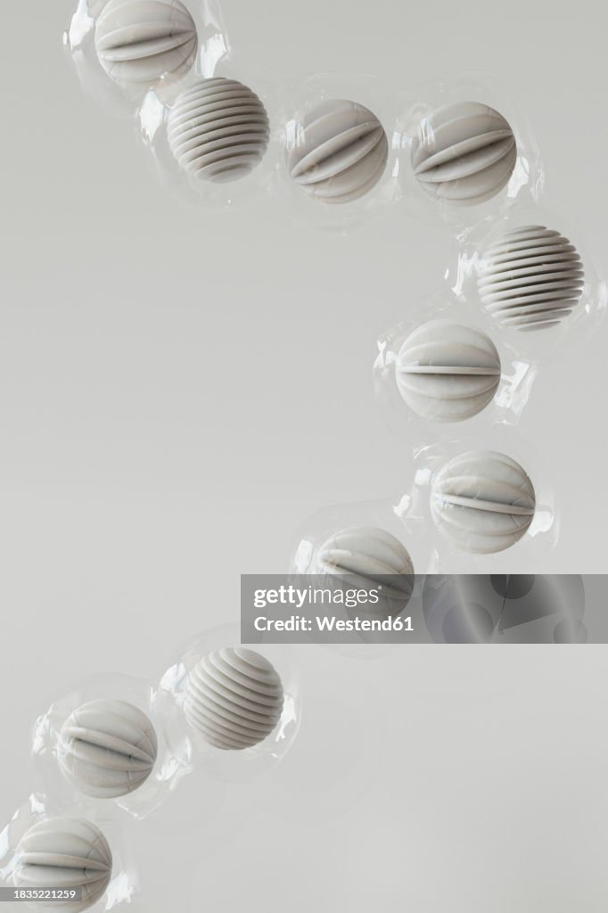 Wrapped Sphere 3d Render Of Row Of Plastic Wrapped Spheres Floating Against White ...