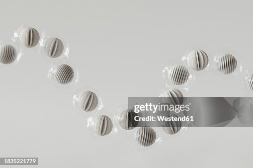 Wrapped Sphere 3d Render Of Row Of Plastic Wrapped Spheres Floating Against White ...
