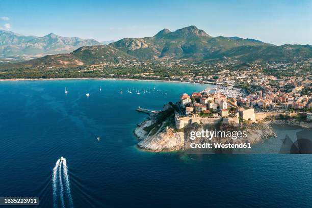 france, haute-corse, calvi, aerial view of town on shore of corsica island - haute corse stock pictures, royalty-free photos & images