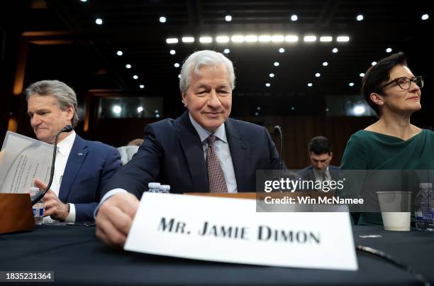 Jamie Dimon, Chairman and CEO of JPMorgan Chase, arrives to testify at a Senate Banking Committee hearing at the Hart Senate Office Building on...