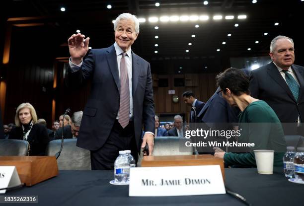 Jamie Dimon, Chairman and CEO of JPMorgan Chase, arrives to testify at a Senate Banking Committee hearing at the Hart Senate Office Building on...