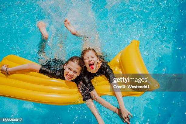 Tween Floating Inpool 15,019 Tweens In Swimsuits Stock Photos, High-Res Pictures, and Images ...