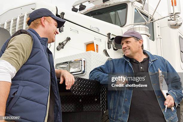 truckers conversation - car transporter stock pictures, royalty-free photos & images