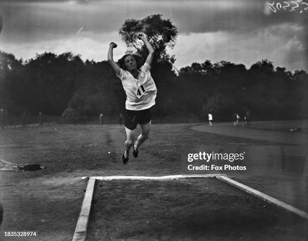Long jumper in action during the Annual Sports Meeting organised by the London Olympiades at Battersea Park, London, UK, September 1929.