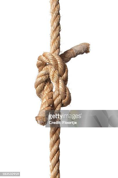 knotted rope on a white background - rope knot stock pictures, royalty-free photos & images