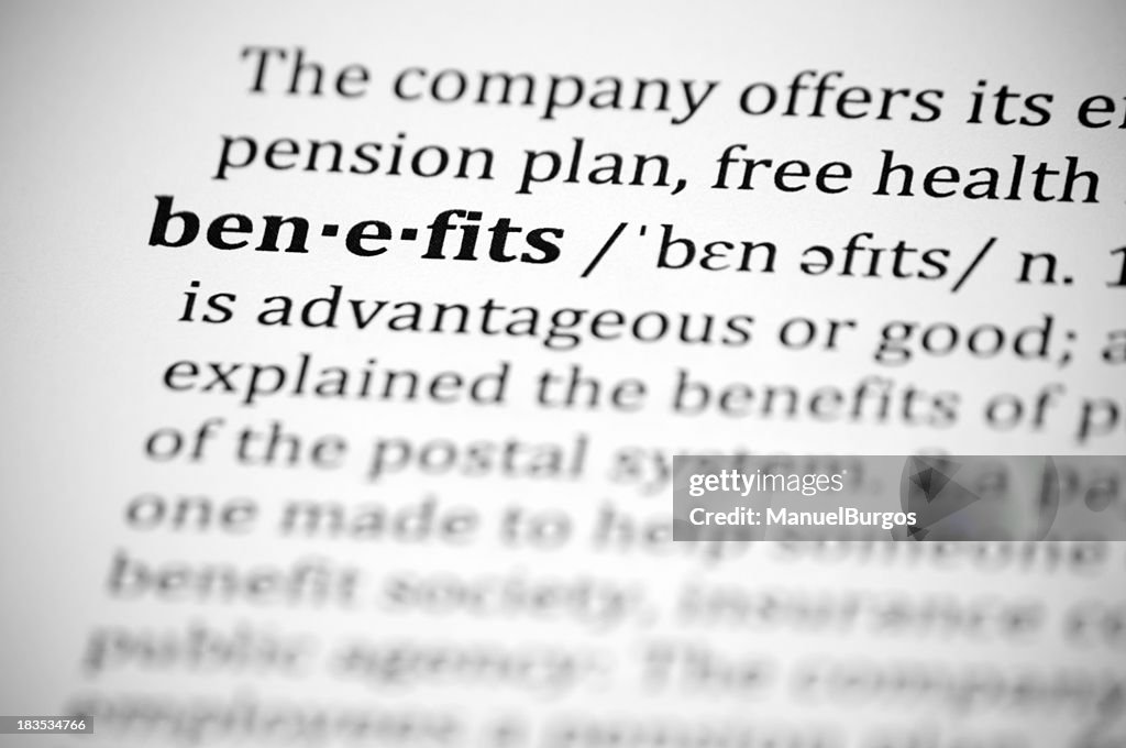 Close-up of definition of word Benefits in dictionary