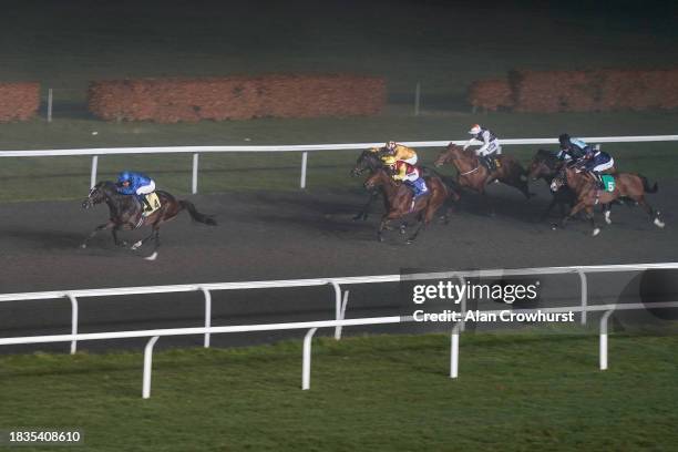 William Buick riding Honest Desire win The Unibet More Extra Place Races Nursery at Kempton Park Racecourse on December 06, 2023 in Sunbury, England.