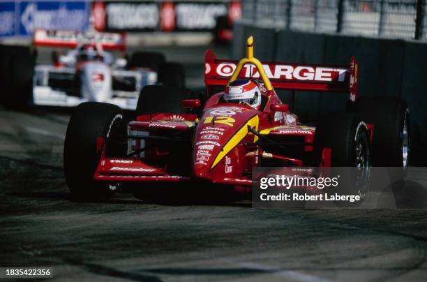 Jimmy Vasser from the United States drives the Target Chip Ganassi Racing Lola B2K/00 Toyota RV8E during the Championship Auto Racing Teams 2000...