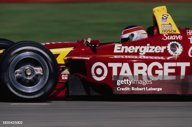 Jimmy Vasser from the United States drives the Target Chip Ganassi Racing Lola B2K/00 Toyota RV8E during practice for the Championship Auto Racing...