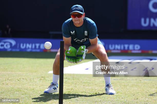 Jos Buttler of England warms up ahead of play during the 2nd CG United One Day International match between West Indies and England at Sir Vivian...