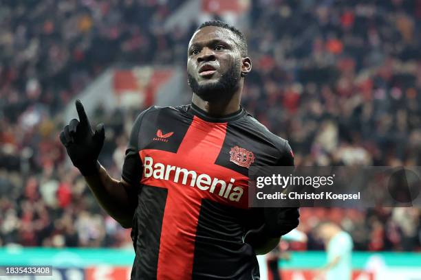 Victor Boniface of Bayer Leverkusen celebrates after scoring the team's first goal during the DFB cup round of 16 match between Bayer 04 Leverkusen...