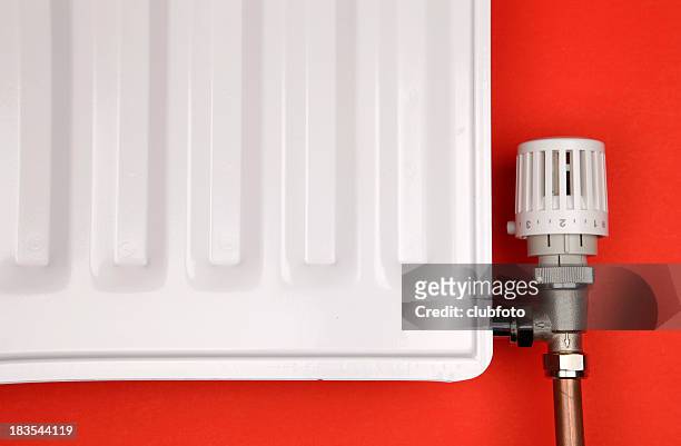 closeup of white radiator and thermostatic valve - ventiler bildbanksfoton och bilder