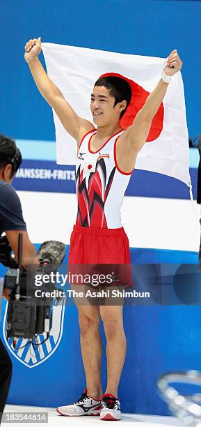 Kenzo Shirai of Japan poses after winning the gold medal in the Floor Exercise Final on Day Six of the Artistic Gymnastics World Championships...