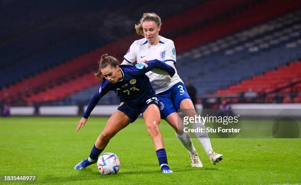 England player Niamh Charles challenges Jamie-Lee Napier of Scotland during the UEFA Womens Nations League match between Scotland and England at...