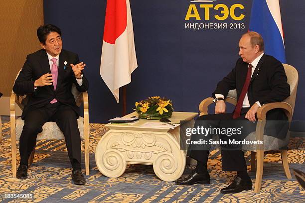 Russian President Vladimir Putin meets with Japanese Prime Minister Shinzo Abe at the APEC Leaders Summit on October 7, 2013 in Denpadsar, Bali,...
