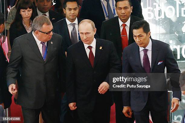 Russian President Vladimir Putin arrives at APEC CEO Summit on October 7, 2013 in Nusa Dua, Indonesia. US President Barack Obama has not attended the...