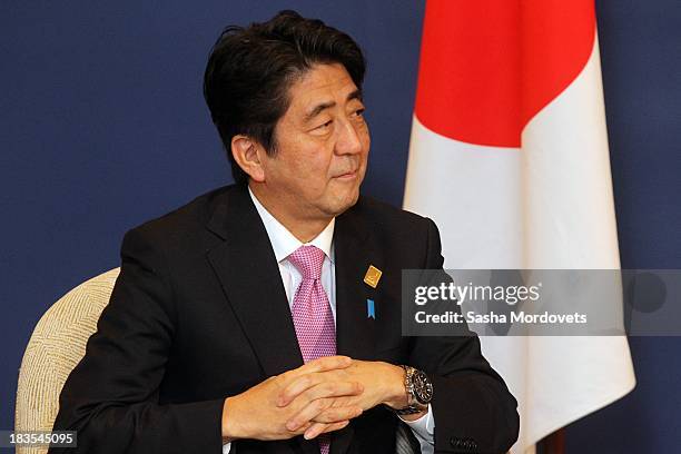 Japanese Prime Minister Shinzo Abe meets with Russian President Vladimir Putin at the APEC Leaders Summit on October 7, 2013 in Denpadsar, Bali,...