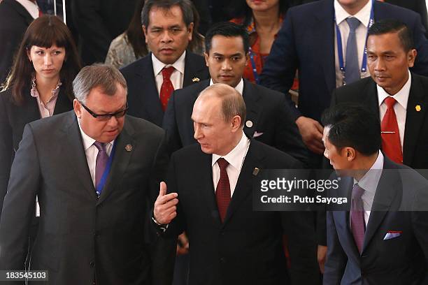 Russian President Vladimir Putin arrives at APEC CEO Summit on October 7, 2013 in Nusa Dua, Indonesia. US President Barack Obama has not attended the...