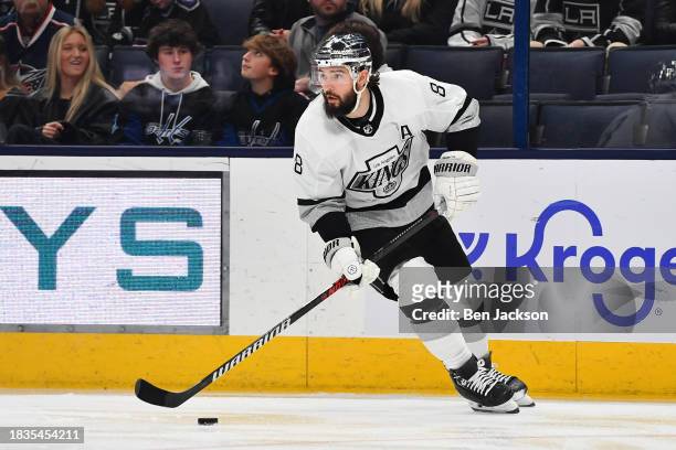 December 5: Drew Doughty of the Los Angeles Kings skates with the puck during the third period of a game against the Columbus Blue Jackets at...