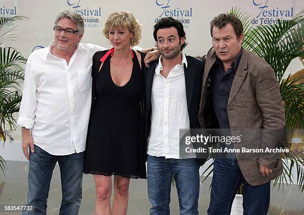 Actors Christian Rauth, Cecile Auclert, Sebastien Knafo and Martin Lamotte attend a photocall promoting the television series 'Pere & Maire' on the...