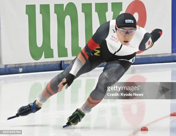 Wataru Morishige of Japan competes en route to winning bronze in the men's 500 meters at a World Cup speed skating meet in Tomaszow Mazowiecki in...