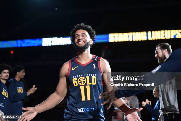 December 8: Braxton Key of the Grand Rapids Gold hi fives teammates vs Iowa Wolves on December 8, 2023 at the Van Andel Arena in Grand Rapids,...