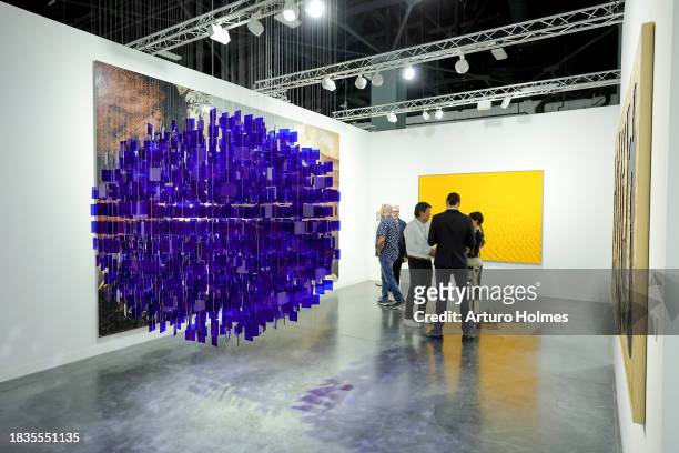 View of the Timothy Taylor booth during the Art Basel Miami Beach VIP Preview 2023 at Miami Beach Convention Center on December 06, 2023 in Miami...