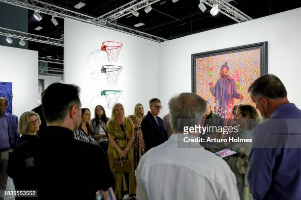 View of art by Awol Erizku during the Art Basel Miami Beach VIP Preview 2023 at Miami Beach Convention Center on December 06, 2023 in Miami Beach,...
