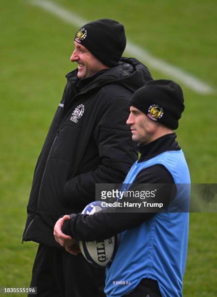Ali Hepher, Coach of Exeter Chiefs looks on alongside Haydn Thomas during a Exeter Chiefs Training Session at Sandy Park on December 06, 2023 in...